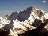 Kathmandu Mountain Flight 09-2 Makalu 1997 The massive west face of Makalu (8462m) is seen from the Kathmandu Mountain Flight. The ridge in the centre of the photo is the exceedingly difficult, very steep Makalu West Pillar. Kangchungtse (7678m, also called Makalu II) is on the left.